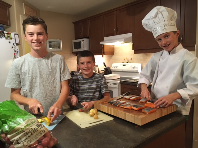 The Little Potato Company's Little Chef Owen cooks at home with his brothers.