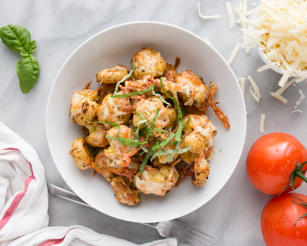 Cheesy Tomato Basil Smashed Potatoes