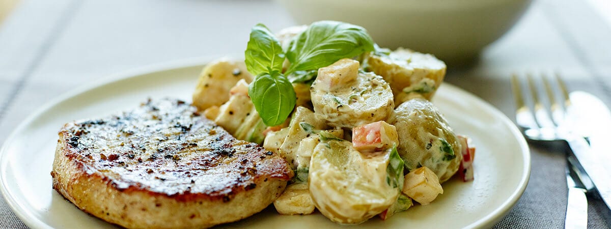 Pork Chops with Potato, Peach, and Basil Salad