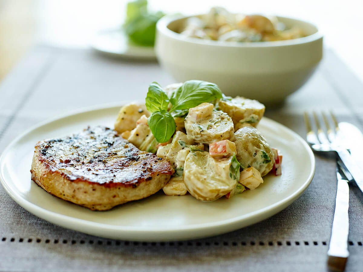 Pork Chops with Potato, Peach, and Basil Salad