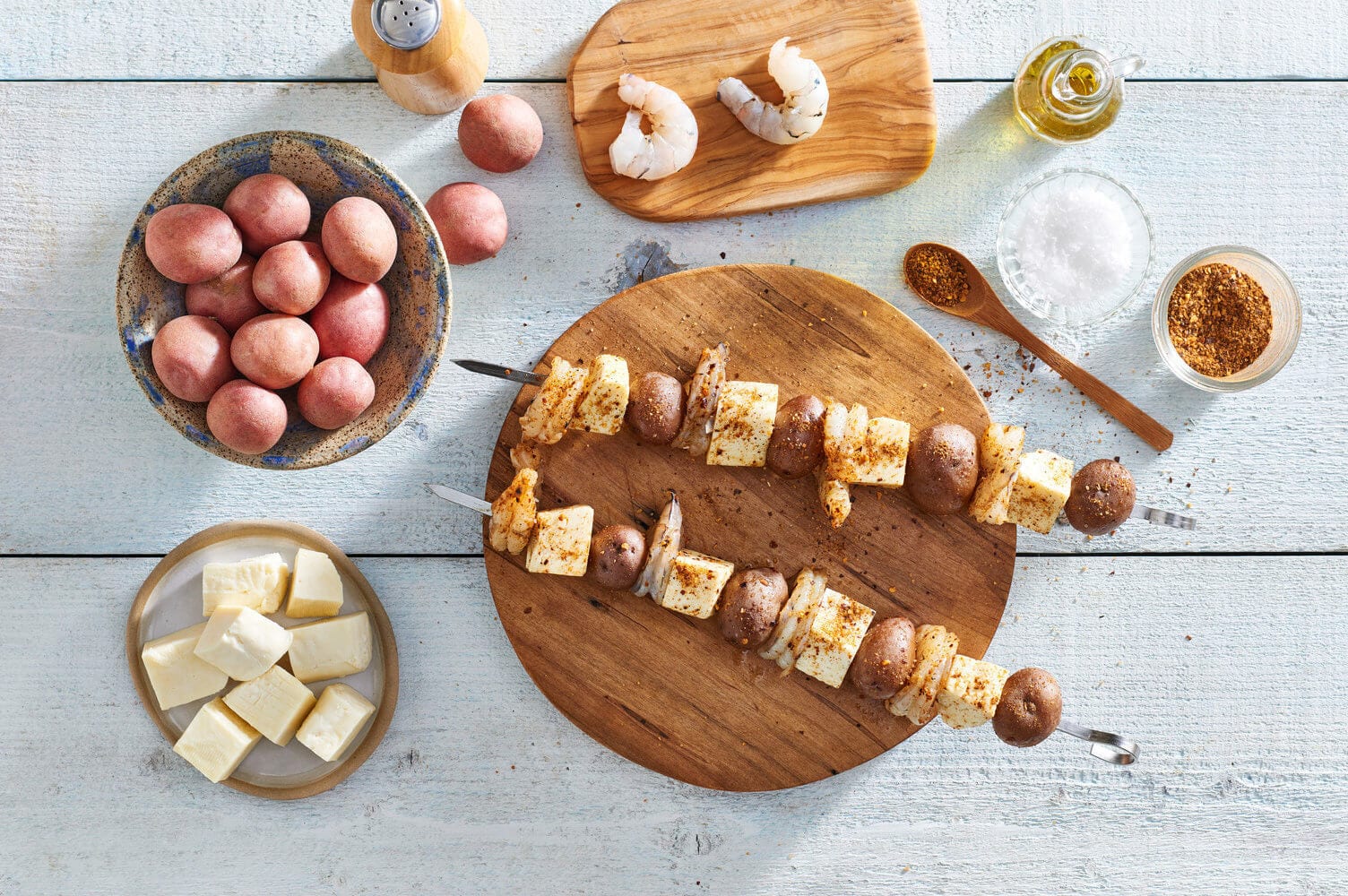 Harissa, Halloumi, and Shrimp Potato Skewers