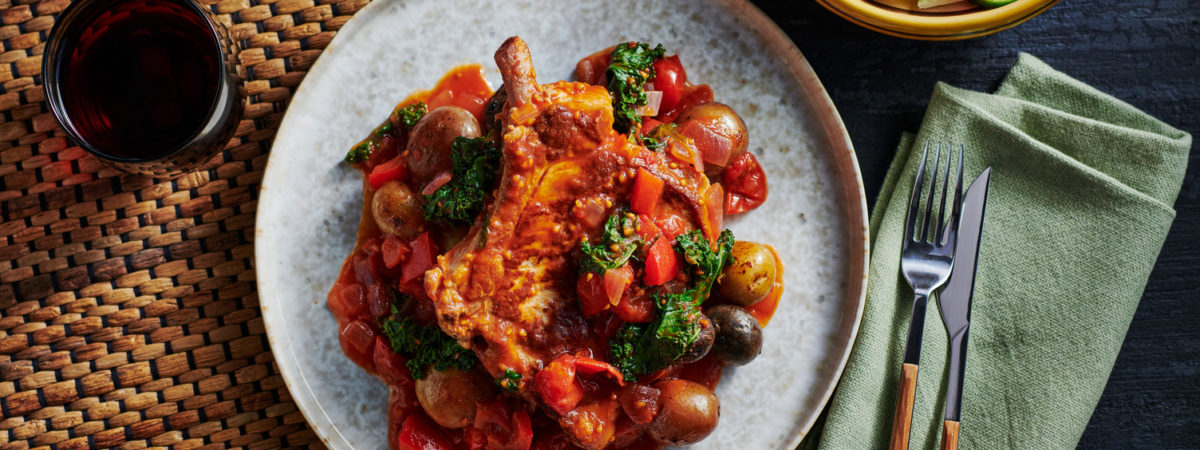 Pork Chops and Potatoes in Tomato Pepper Sauce